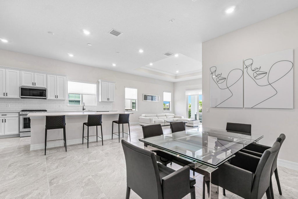 Photo of 12325 FRONTLINE Lane, Palm Beach Gardens, FL 33412 (MLS # B26092428)