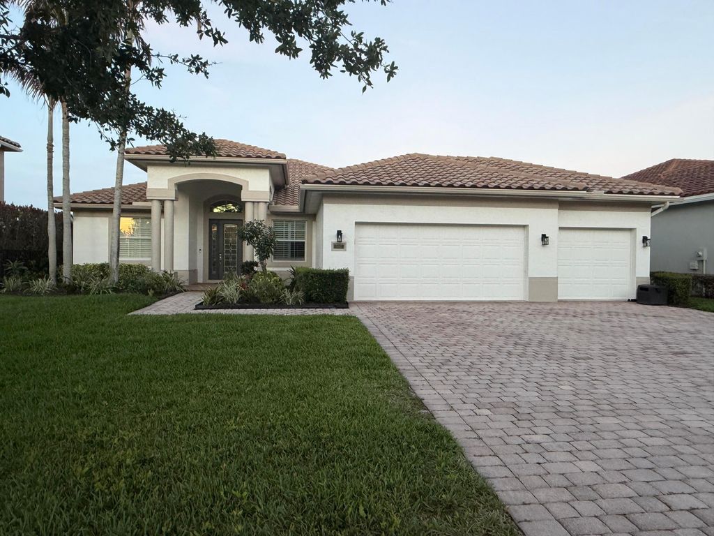 Photo of 5887 SW Longspur Lane, Palm City, FL 34990 (MLS # B26026737)