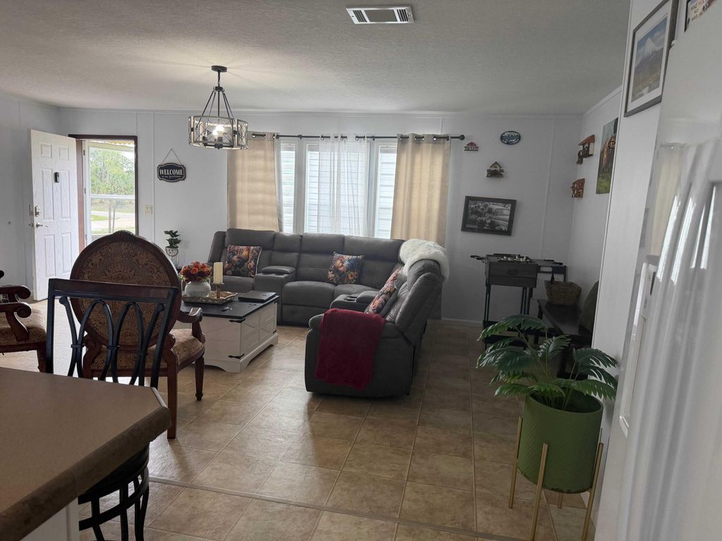 Photo of 445 Hunting Club Avenue, Clewiston, FL 33440 (MLS # B26013165)