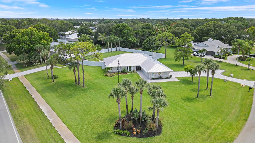 Photo of 386 NE Ficus Terrace, Jensen Beach, FL 34957 (MLS # R11094962)