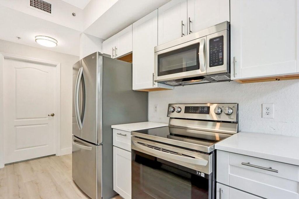 Photo of 11012 Legacy Drive #101, Palm Beach Gardens, FL 33410 (MLS # R11079101)