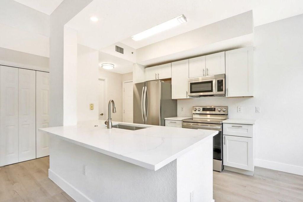 Photo of 11012 Legacy Drive #101, Palm Beach Gardens, FL 33410 (MLS # R11079101)