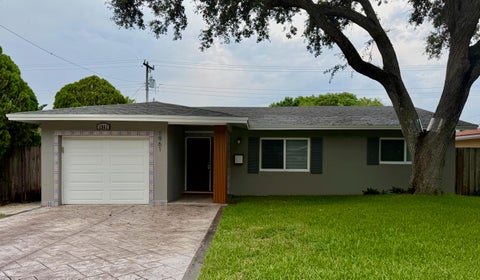 Photo of 1961 NW 43rd Court, Oakland Park, FL 33309 (MLS # B26046573)