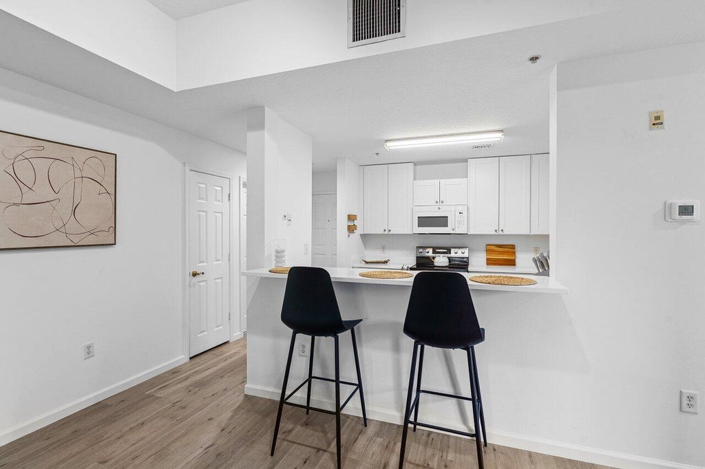 Photo of 1209 Main Street #302, Jupiter, FL 33458 (MLS # R11070057)