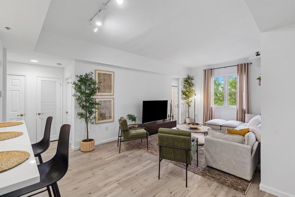 Photo of 1209 Main Street #302, Jupiter, FL 33458 (MLS # R11070057)