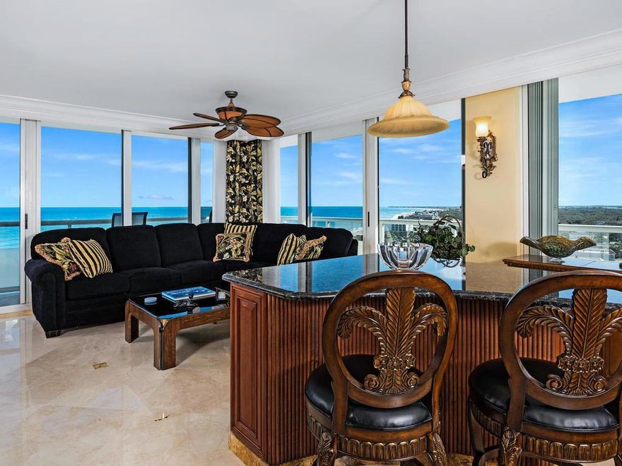 Enjoy ocean to river views from this one of a kind 3BR/3BA + den Penthouse condo on top of Village Spires. Southern exposures makes it light and bright. Marble floors, fireplace, custom built-ins, wrap around balconies. Sunrise and sunset views - it has it all! Located next to Vero Beach Hotel & Spa in the heart of Vero's beachside town. Walk to shops and restaurants. All sizes approx.