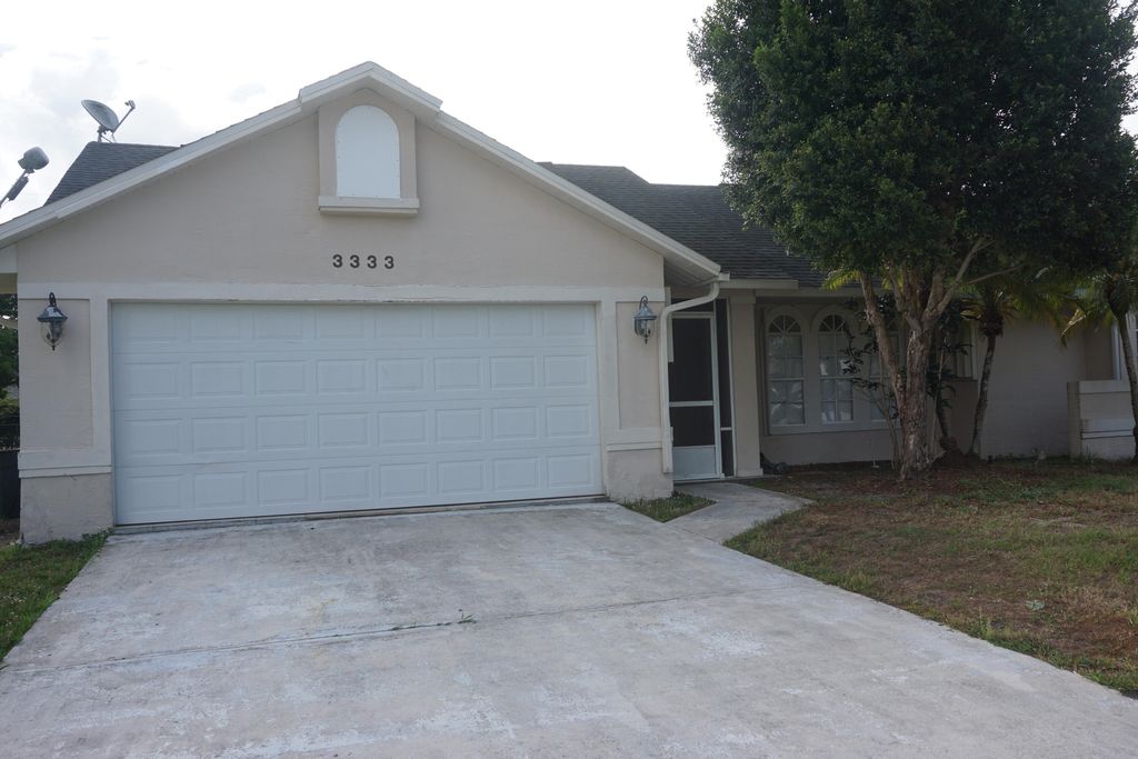 Photo of 3333 SW Perrine Street, Port Saint Lucie, FL 34953 (MLS # R10796223)