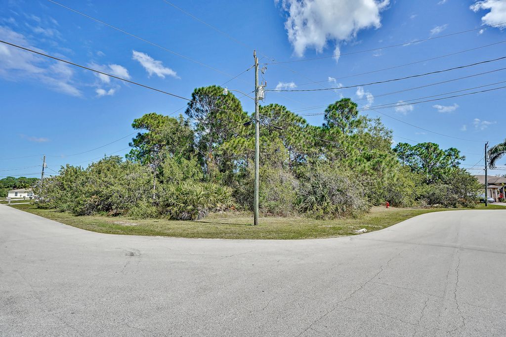 Photo of 5851 NW Fogel Court, Port Saint Lucie, FL 34986 (MLS # R10781089)
