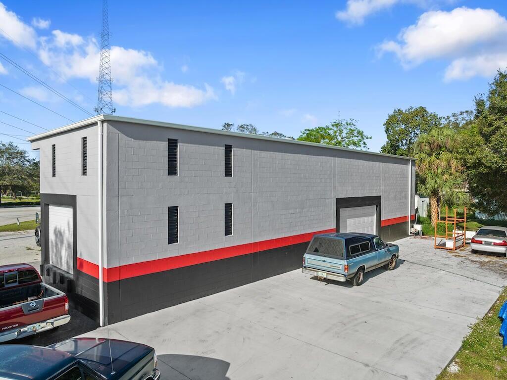 Okeechobee Road frontage, two loading / receiving docks, open warehouse, office space with a/c, 1 bedroom apartment on second floor. storage racks (second floor)