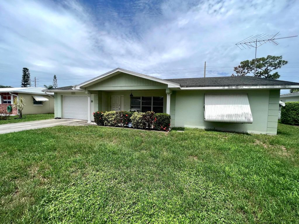 Photo of 213 E Arbor Avenue, Port Saint Lucie, FL 34952 (MLS # R11001622)