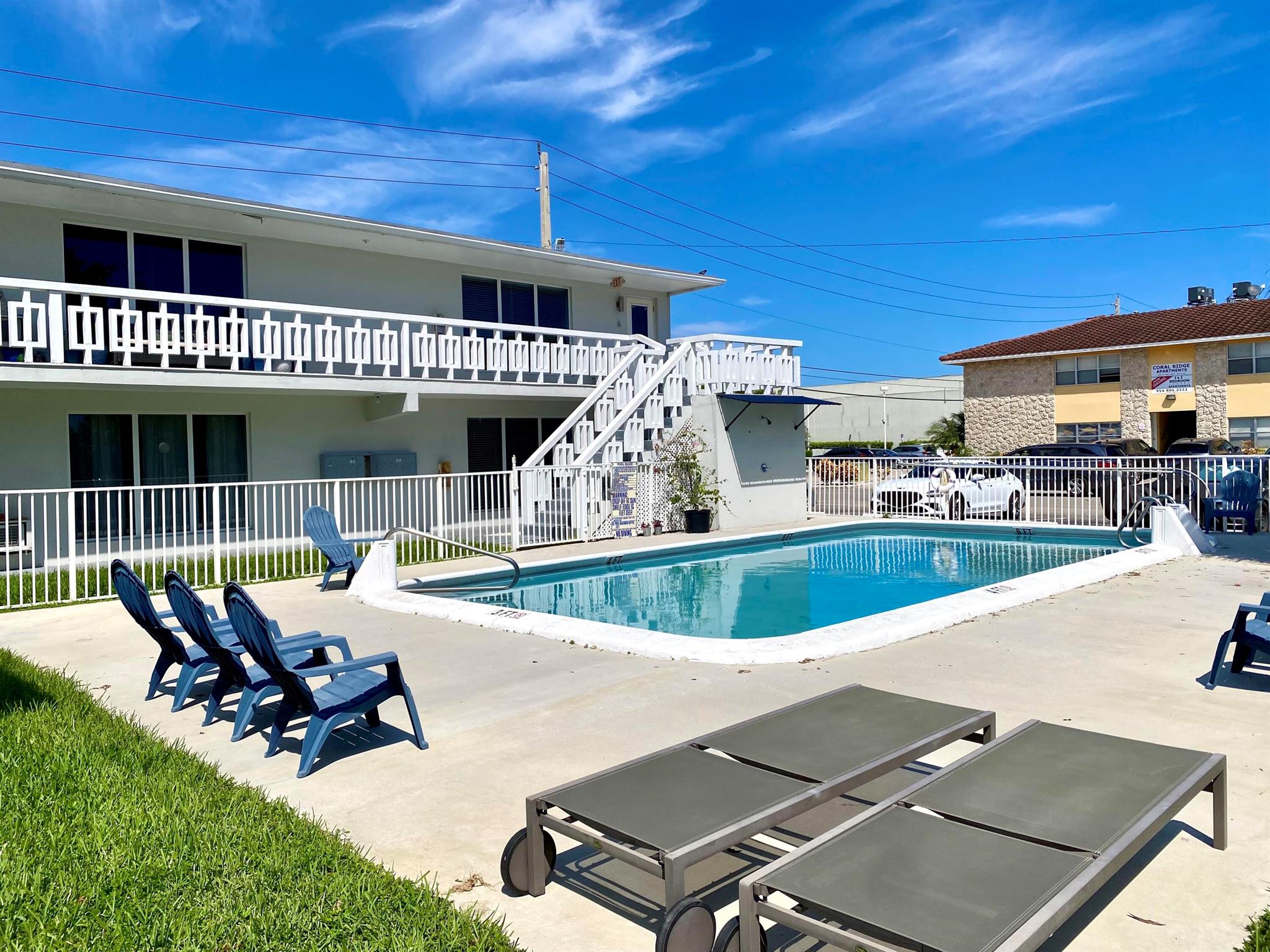 Great location in Coral Ridge! No-HOA and fast approval! JUST 5 MINUTES TO THE BEACH, east of US-1, next to Coral Ridge Country Club, Lauderdale-by-the-Sea beach and many restaurants! First floor corner 1 bed/1 bath unit has been completely renovated - NEW kitchen, bath, floors, fixtures. Good closet space with walk-in closet in bedroom. Located in a quiet small apartment complex with its own sparkling community pool and lounge chairs for relaxing outside! 1 designated parking spot + guest parking available. Pets OK. Easy coin-laundry in the building. Water INCLUDED in rent. Tenant pays electric/cable. I have 2 other identical 1B/1B units available here as well - both corner units on second floor