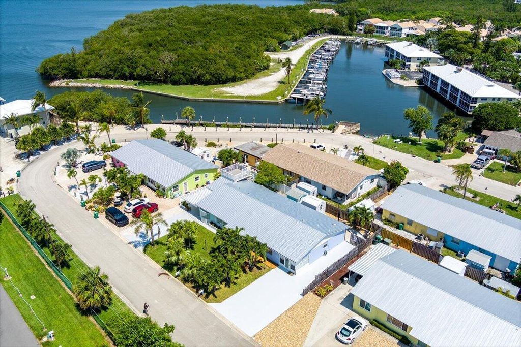 Photo of 71 S Las Olas Drive, Jensen Beach, FL 34957 (MLS # R11089561)