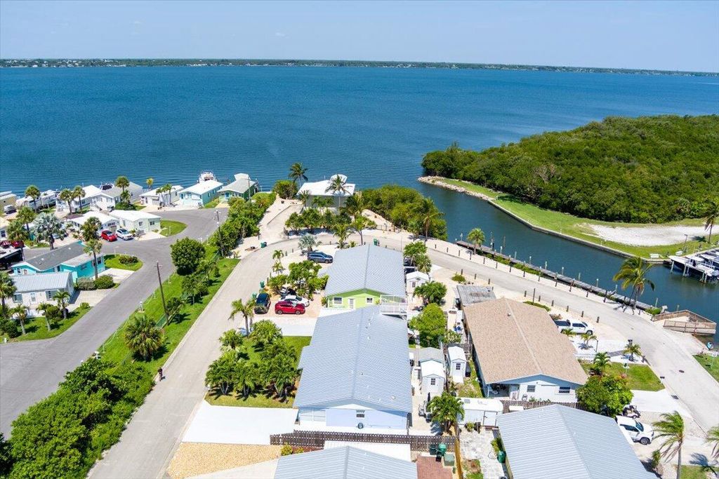 Photo of 71 S Las Olas Drive, Jensen Beach, FL 34957 (MLS # R11089561)