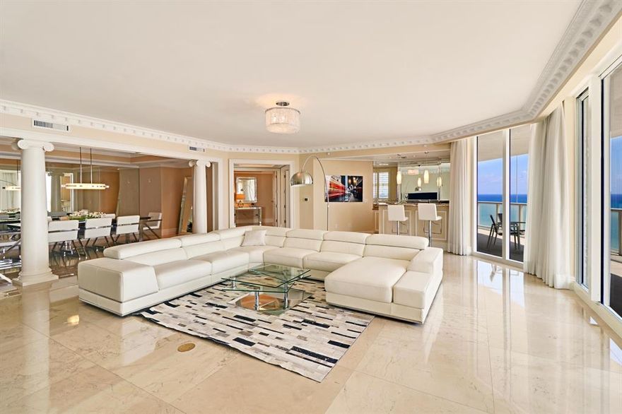Incredible panoramic direct ocean and intracoastal views.  Numerous upgrades including 36'' marble floors, sub-zero wine cooler, custom built-ins in the office and custom closets.