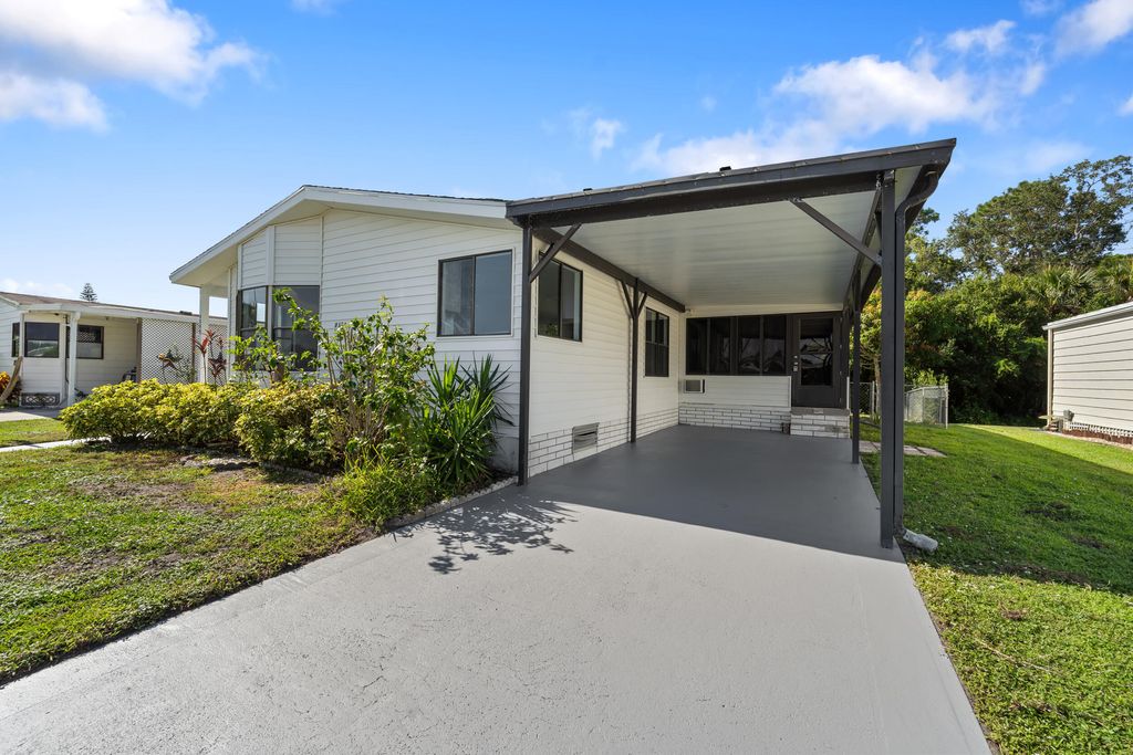 Photo of 8589 Florence Drive, Port Saint Lucie, FL 34952 (MLS # B26002661)