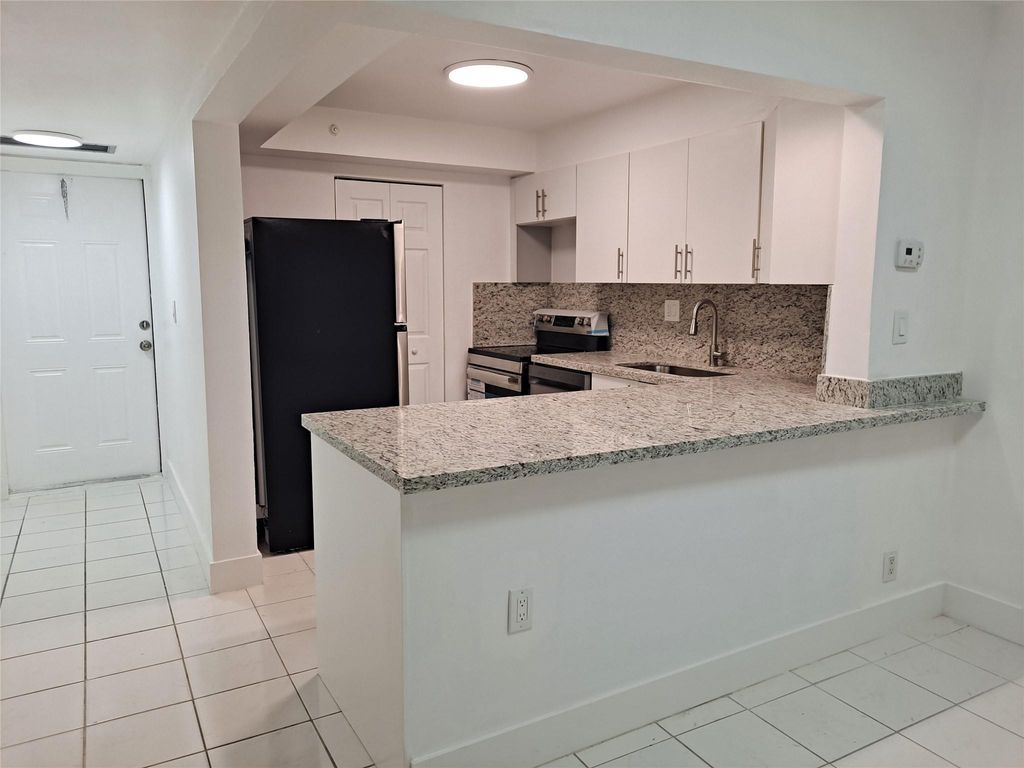 Photo of 8000 Fairview Drive #110, Tamarac, FL 33321 (MLS # F10549910)