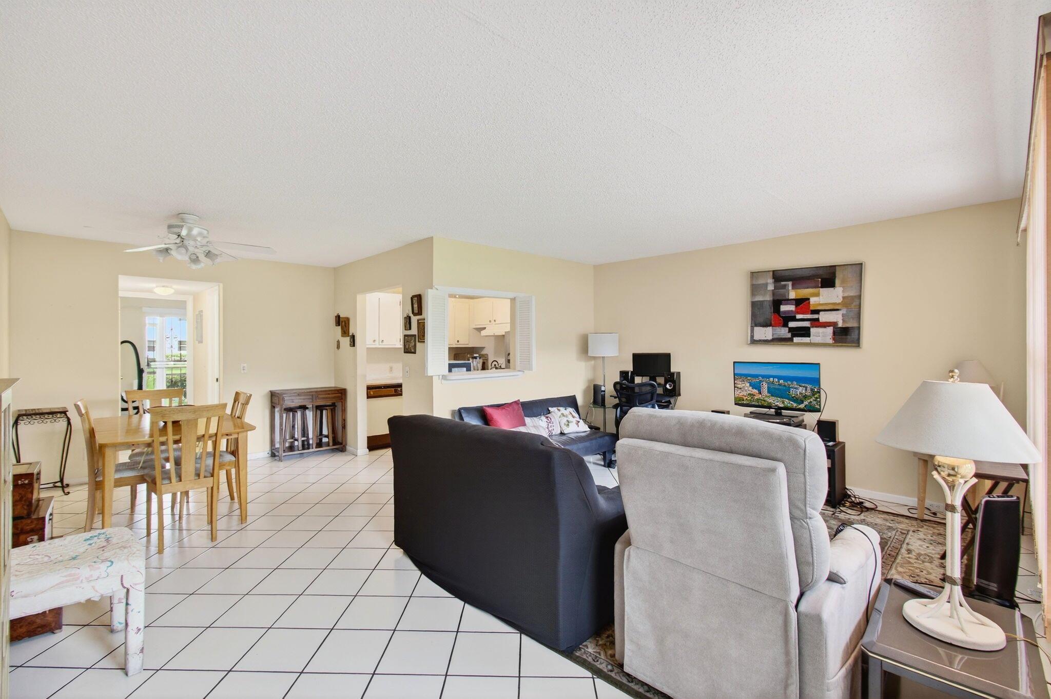 CENTURY VILLAGE---ACTIVE ADULT COMMUNITY--55+.ATTENTION INVESTORS AND HANDYMAN ENTHUSIASTS!DON'T MISS THIS OPPORTUNITY!The unit is on the GROUND FLOOR and offers a lovely garden view AND beautiful lake view. The bedroom provides ample closet space, carpeting, and an en-suite bathroom with a shower and tub combo. The screened-in patio offers plenty of room for seating, dining, and entertaining. The building's convenient location allows for a 10-15 minute walk to places of worship.