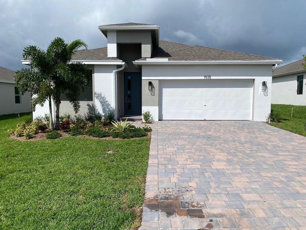 Photo of 1935 NE Ocean Dunes Drive, Jensen Beach, FL 34957 (MLS # R10913942)