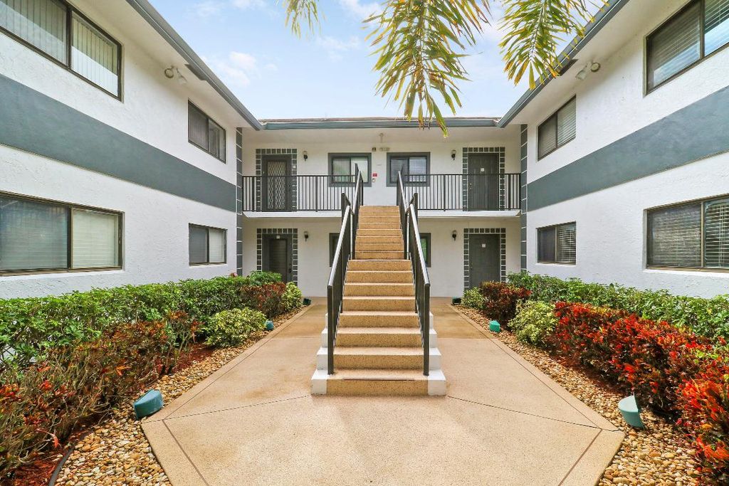 Photo of 15364 Lakes Of Delray Boulevard #61, Delray Beach, FL 33484 (MLS # R11154893)