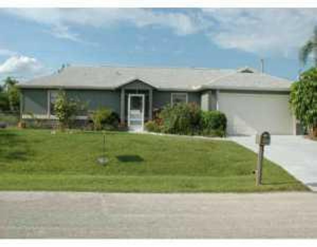 Photo of 505 SW Bradshaw Circle, Port Saint Lucie, FL 34953 (MLS # R10801519)
