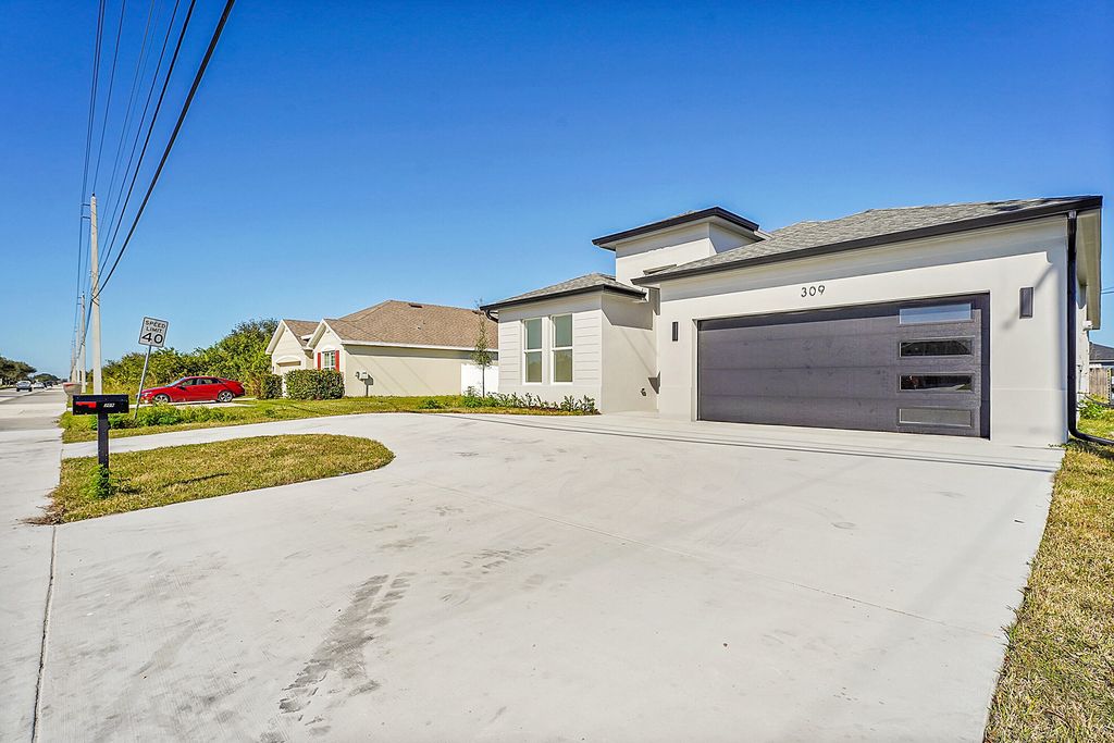 Photo of 309 SW Becker Road, Port Saint Lucie, FL 34953 (MLS # R11056064)