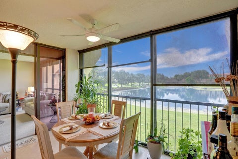 Photo of 5344 Woodland Lakes Drive #223, Palm Beach Gardens, FL 33418 (MLS # B26045362)