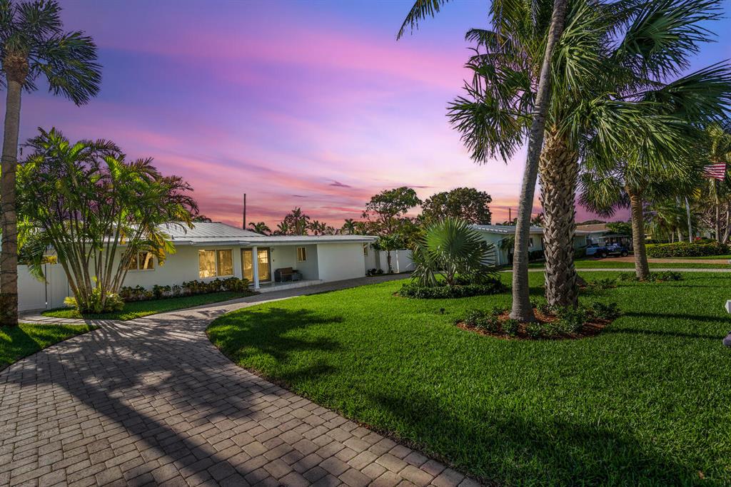 Introducing this magnificent home in Lighthouse Point, a highly sought-after boating community known for its luxurious waterfront properties and proximity to the Intracoastal Waterway. This stunning home offers the perfect combination of modern luxury and coastal charm, making it the perfect choice for anyone looking for the ultimate Florida lifestyle with no HOA.As soon as you step inside this 4-bedroom, 3-bathroom two story home, you'll be immediately struck by the bright and airy living spaces, which have been thoughtfully designed to maximize natural light and create a welcoming atmosphere. The spacious living room is the perfect spot for relaxing with family and friends, while the adjacent dining or backyard is perfect for entertaining.