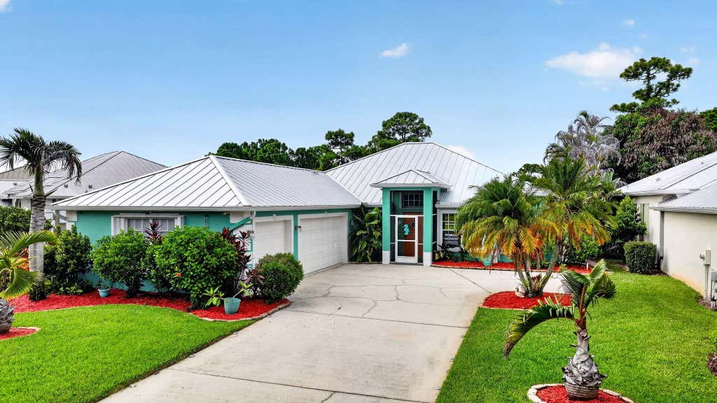 Photo of 482 NW Sunflower Place, Jensen Beach, FL 34957 (MLS # B26058211)