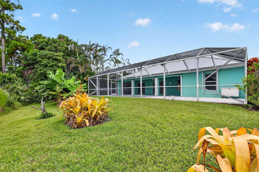 Photo of 482 NW Sunflower Place, Jensen Beach, FL 34957 (MLS # B26058211)