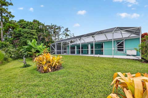 Photo of 482 NW Sunflower Place, Jensen Beach, FL 34957 (MLS # B26058211)