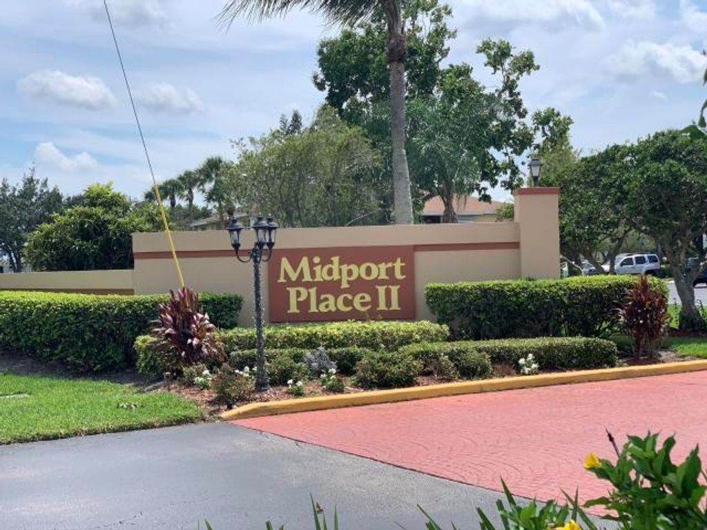 Photo of 1536 SE Royal Green Circle #104, Port Saint Lucie, FL 34952 (MLS # R11059391)