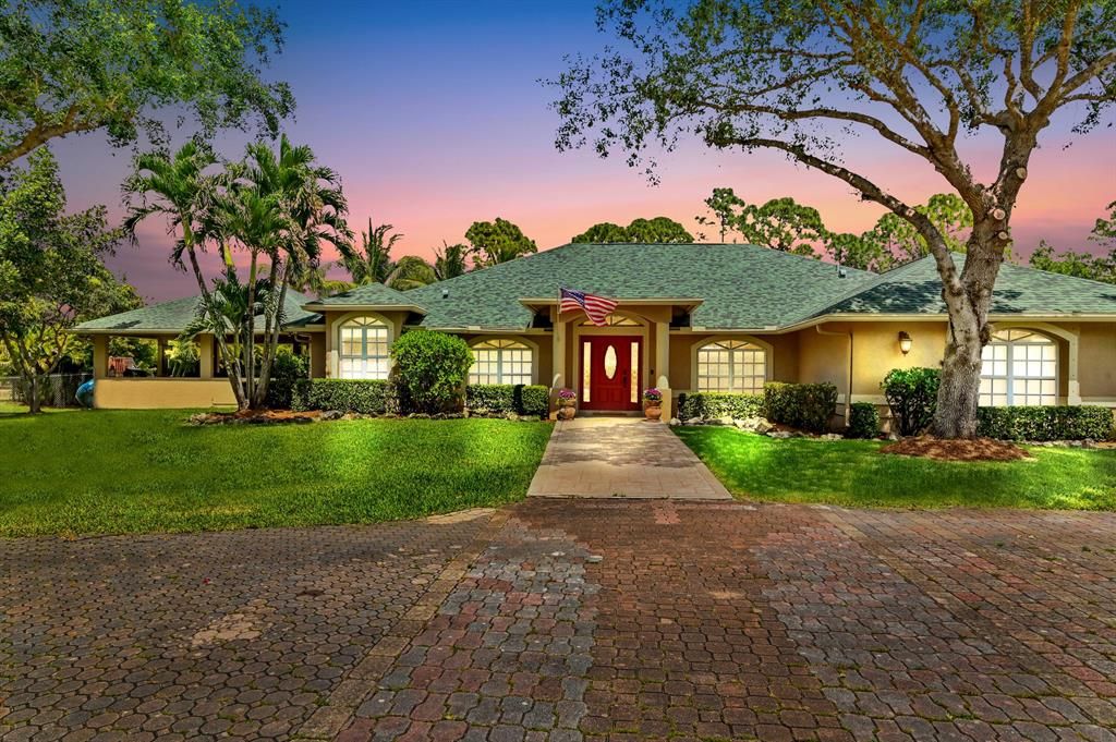 Photo of 14719 Temple Boulevard, Loxahatchee, FL 33470 (MLS # R10877455)