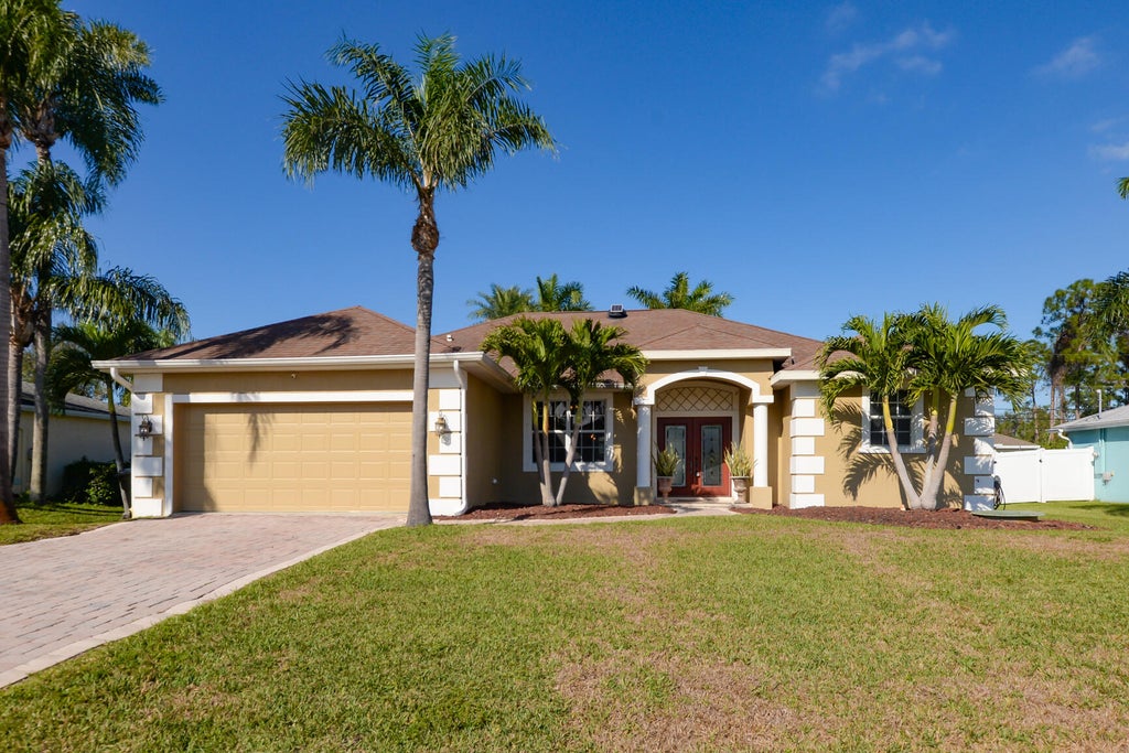 Photo of 1057 SW Goodman Avenue, Port Saint Lucie, FL 34953 (MLS # R11047429)