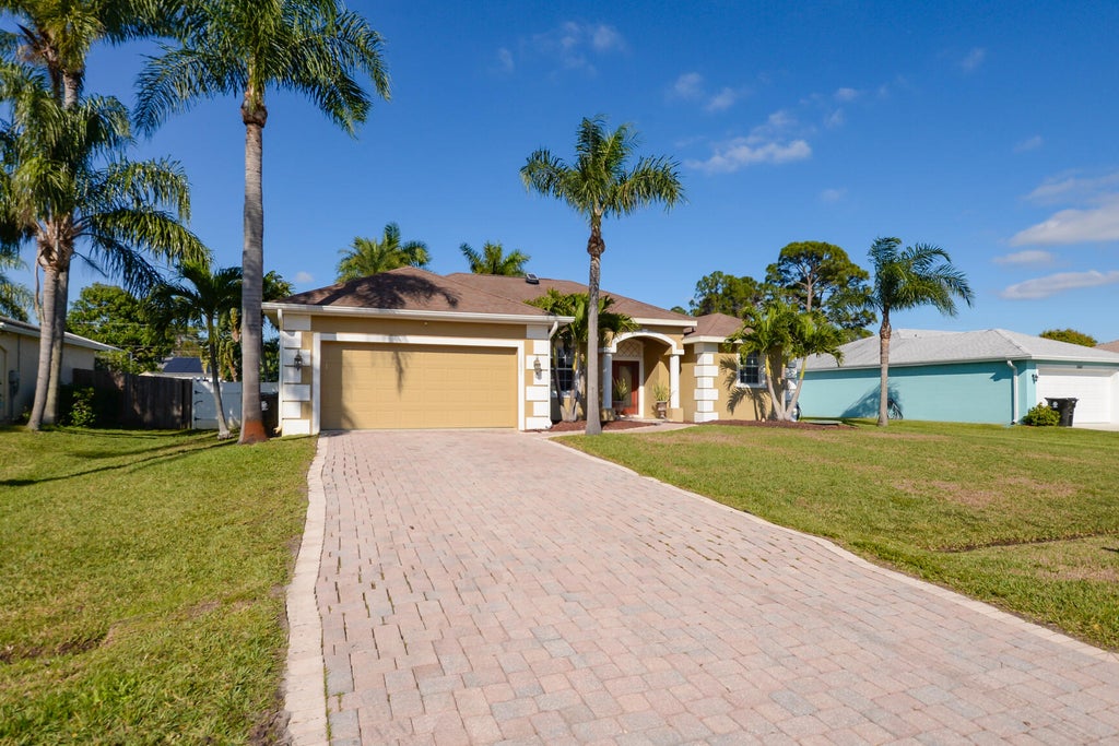 Photo of 1057 SW Goodman Avenue, Port Saint Lucie, FL 34953 (MLS # R11047429)