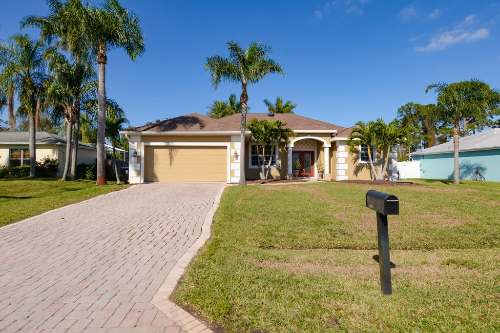 Photo of 1057 SW Goodman Avenue, Port Saint Lucie, FL 34953 (MLS # R11047429)