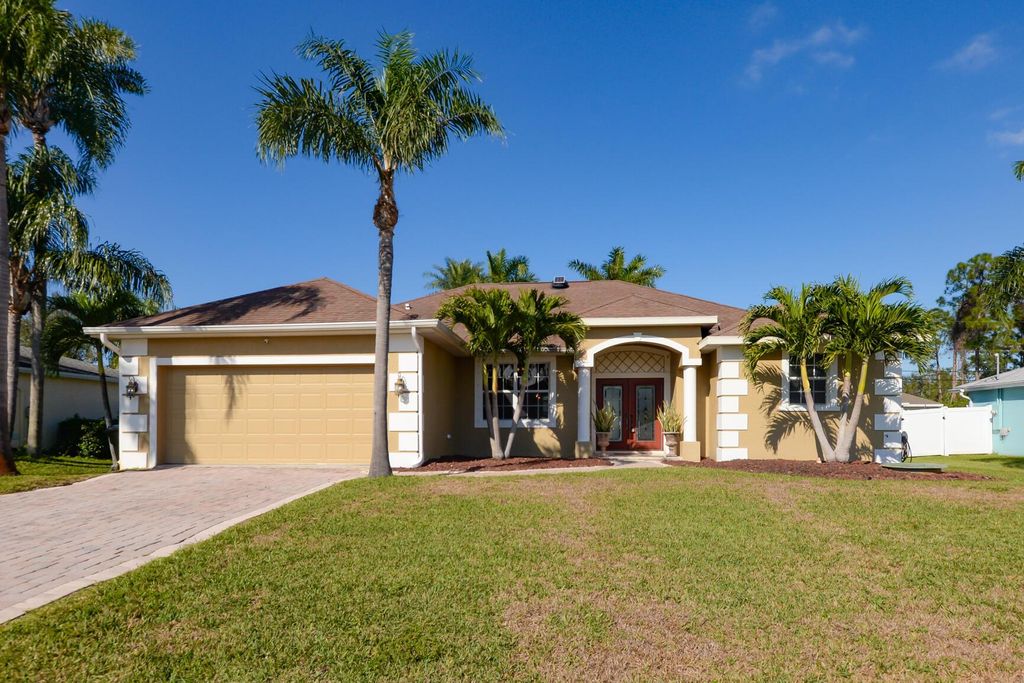 Photo of 1057 SW Goodman Avenue, Port Saint Lucie, FL 34953 (MLS # R11047429)