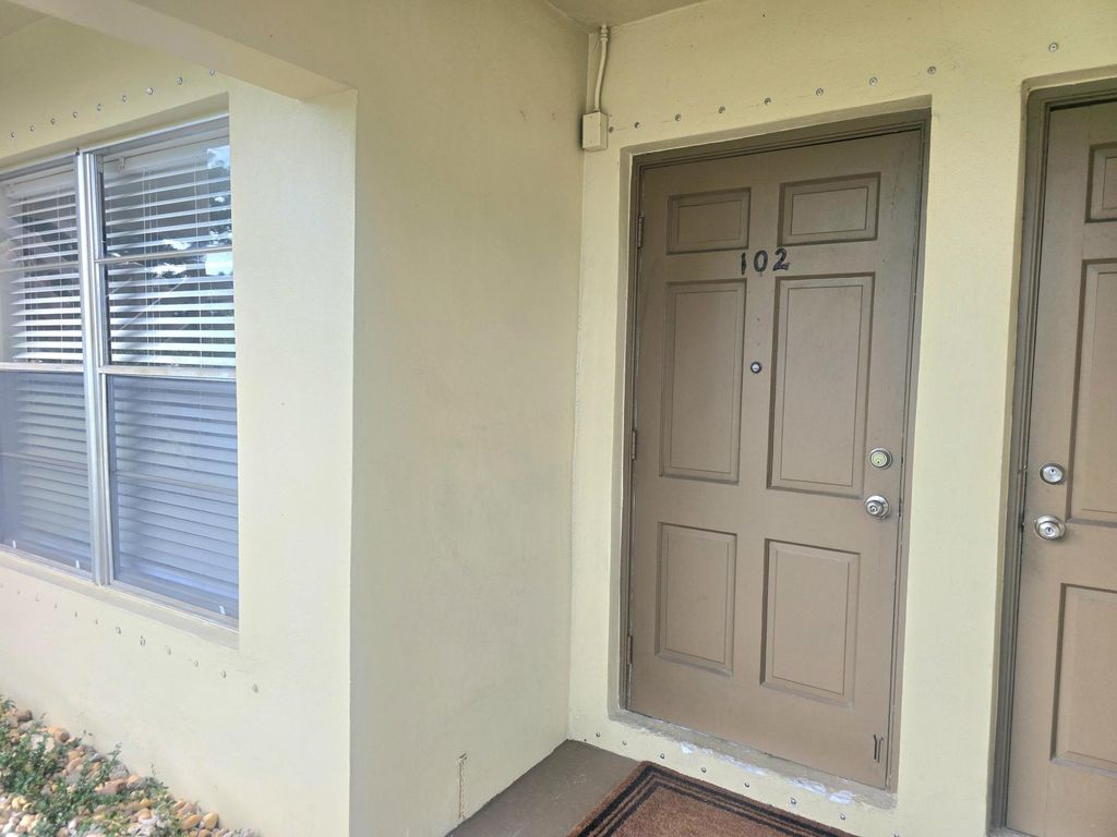 Photo of 3030 NW 43rd Terrace #102, Lauderdale Lakes, FL 33313 (MLS # B26010011)