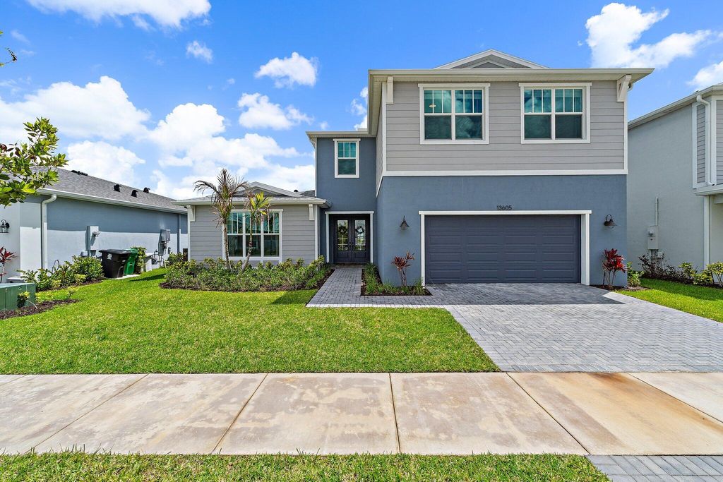 Photo of 13605 SW Bally Drive, Port Saint Lucie, FL 34987 (MLS # B26016738)