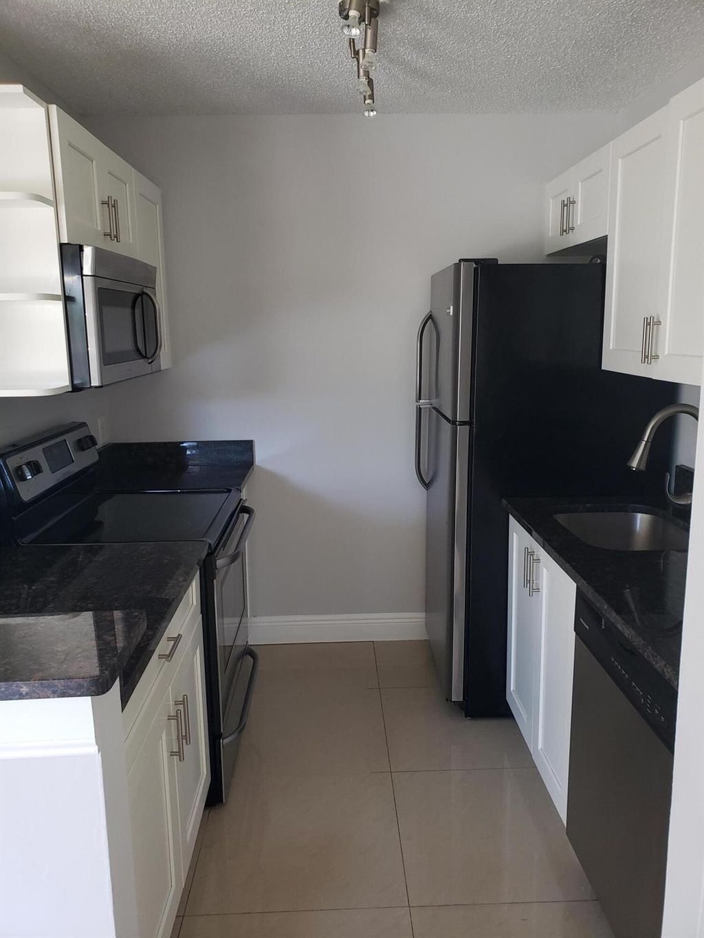 Photo of 25 Crossings Circle #F, Boynton Beach, FL 33435 (MLS # R11096866)