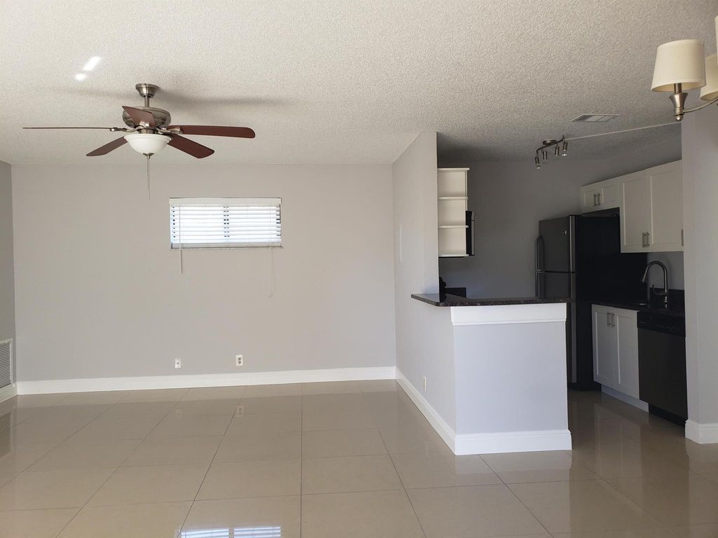 Photo of 25 Crossings Circle #F, Boynton Beach, FL 33435 (MLS # R11096866)
