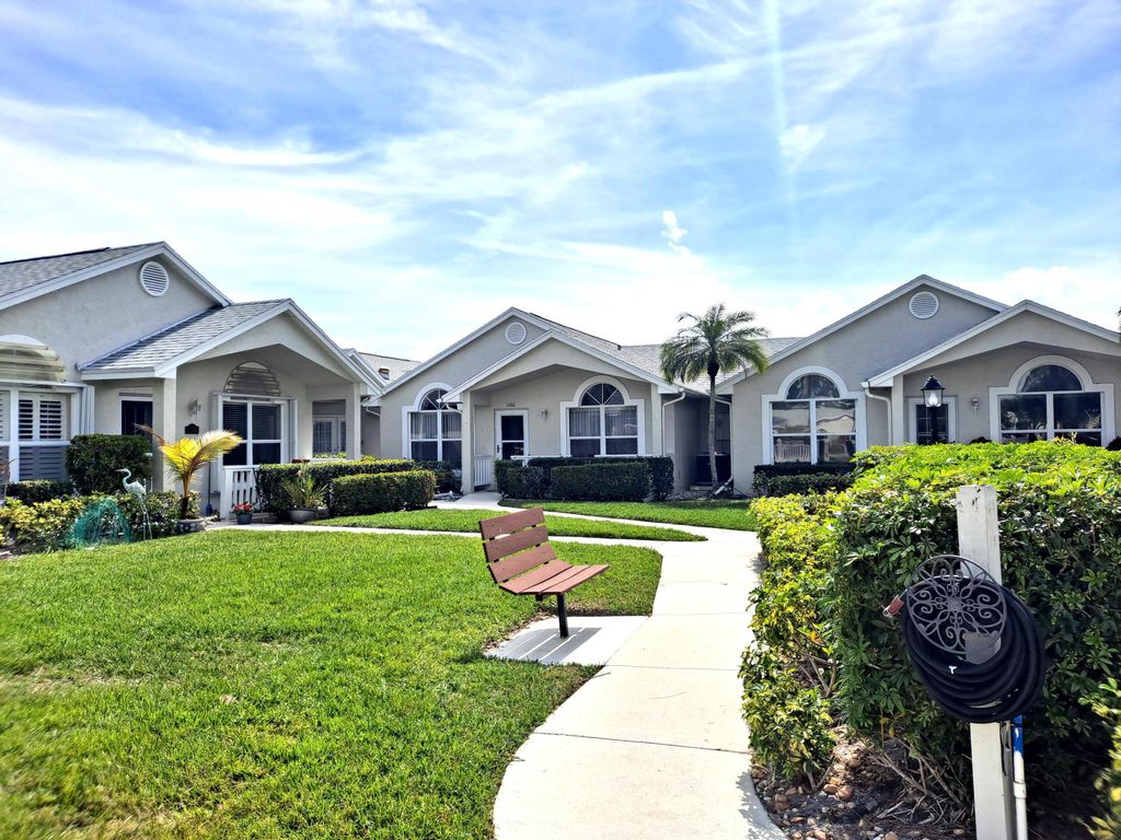 Photo of 1160 NW Lombardy Drive, Port Saint Lucie, FL 34986 (MLS # R10964479)