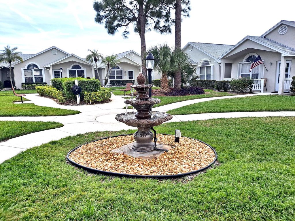 Photo of 1160 NW Lombardy Drive, Port Saint Lucie, FL 34986 (MLS # R10964479)