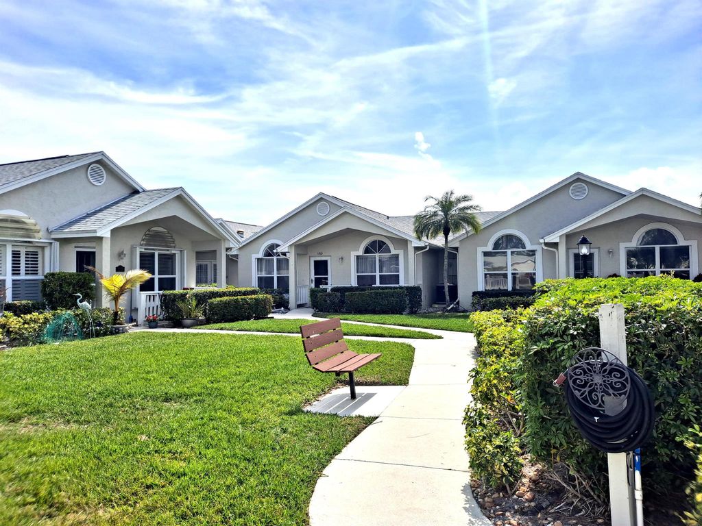 Photo of 1160 NW Lombardy Drive, Port Saint Lucie, FL 34986 (MLS # R10964479)