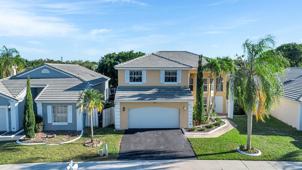 Photo of 5216 NW 55th Street, Coconut Creek, FL 33073 (MLS # R11143502)