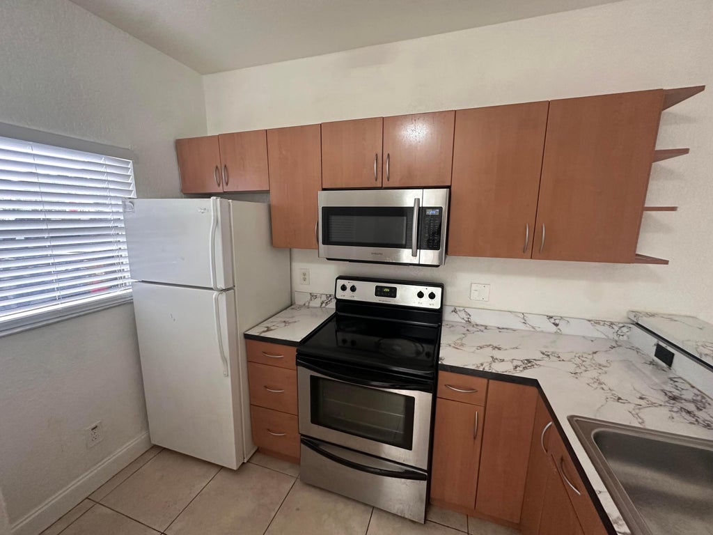 Photo of 3590 NW 91ST Lane #3590, Sunrise, FL 33351 (MLS # B26062715)