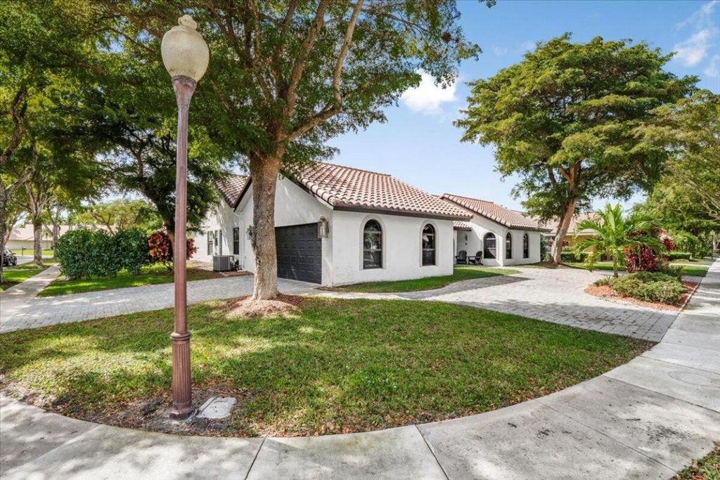 Photo of 2766 NW 46th Street, Boca Raton, FL 33434 (MLS # R11064946)
