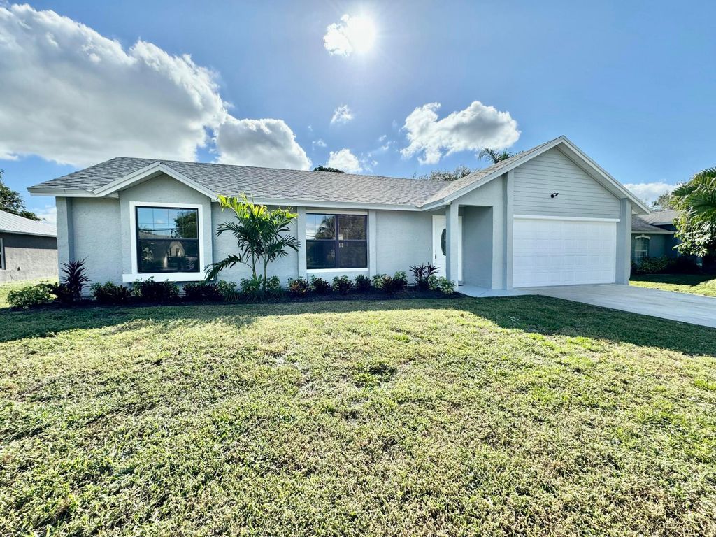 Photo of 482 SW Lucero Drive, Port Saint Lucie, FL 34983 (MLS # R11046991)