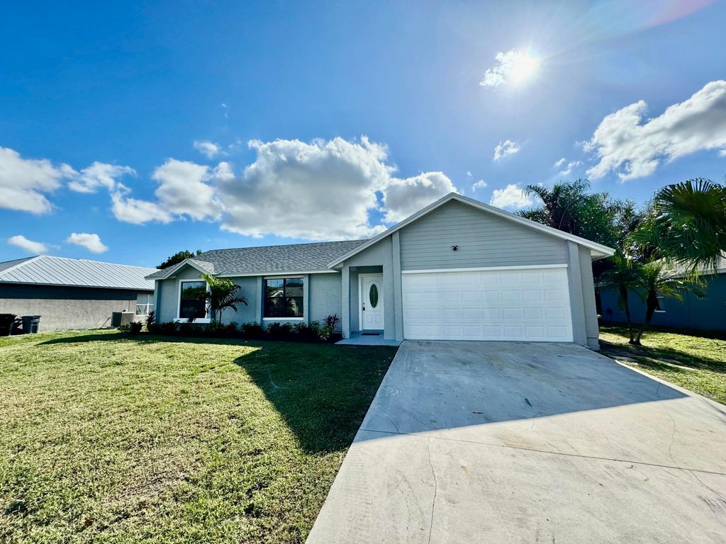 Photo of 482 SW Lucero Drive, Port Saint Lucie, FL 34983 (MLS # R11046991)