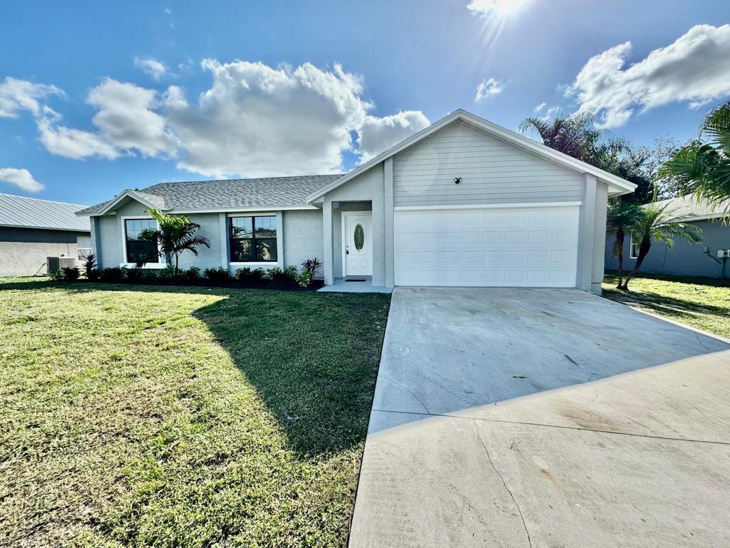 Photo of 482 SW Lucero Drive, Port Saint Lucie, FL 34983 (MLS # R11046991)