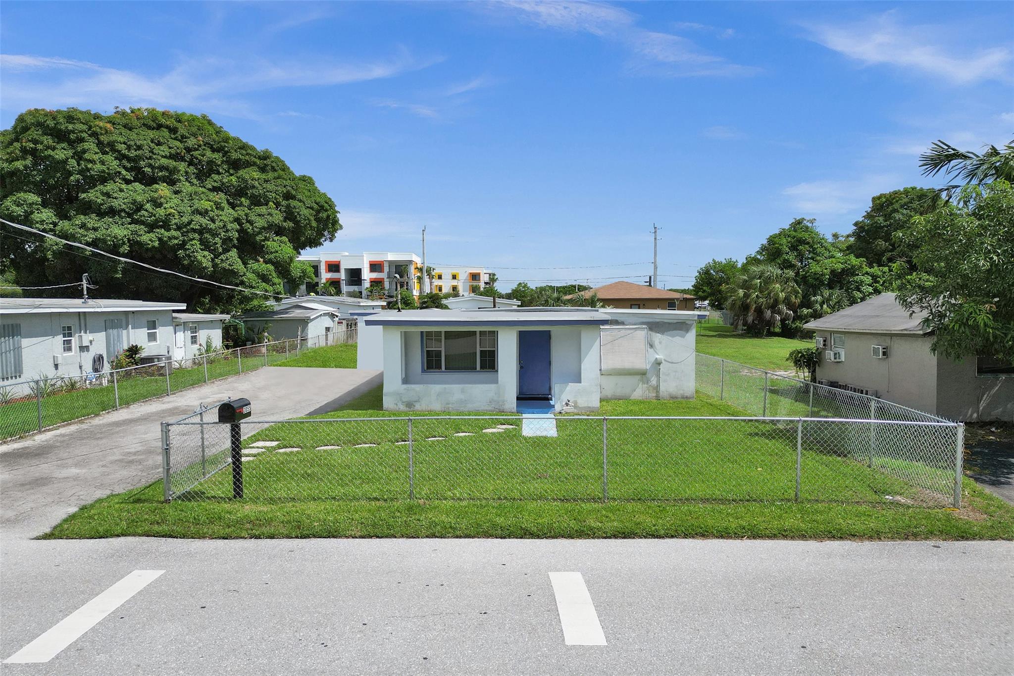 Explore the potential of this Pompano Beach property. Whether you choose to renovate and convert it into a profitable rental or start fresh with a brand-new build, the value here lies in the land and the growing demand within this neighborhood located in the Pompano Beach Community Redevelopment Agency Northwest District. Situated just two blocks from a new construction community, this property is positioned for strong future appreciation. Its location offers easy access to major highways, shopping, dining, and 15 minutes from the beaches of Pompano. With some TLC, this property can truly shine—making it a smart investment for both developers and investors looking to capitalize on an evolving area.